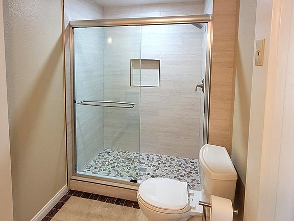 newly remodeled shower connected to bed room