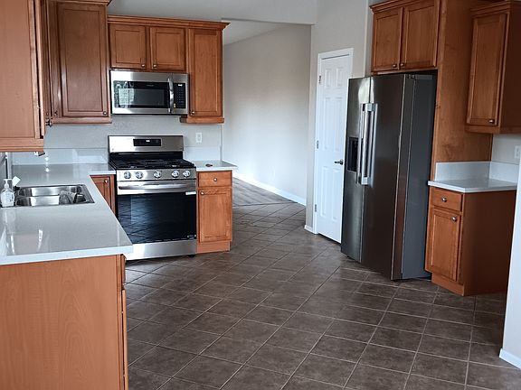 Kitchen all new appliances dishwasher, refrigerator, microwave, range