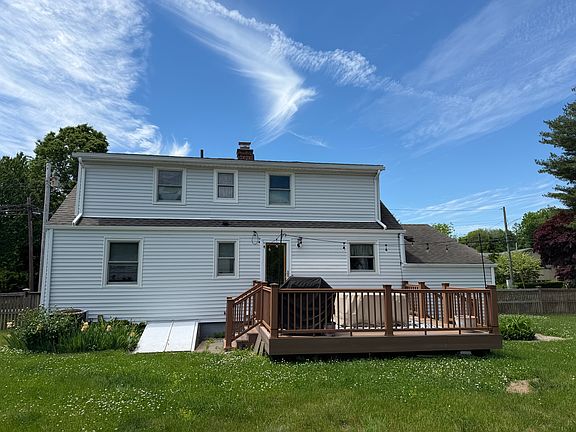 fenced in yard with 12 x 14 deck.
