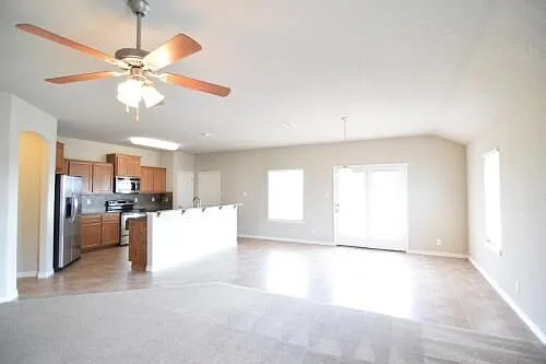 Lots natural light for the living room shows the lovely dinette and kitchen open concept for being together.