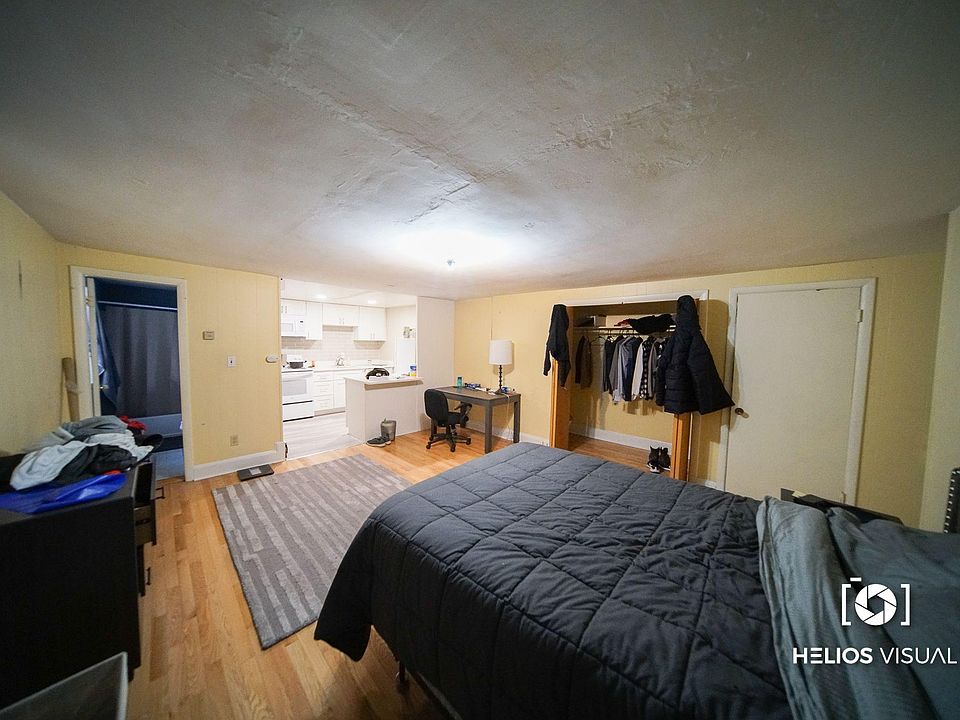 Living Area with kitchen and bathroom in rear of photo