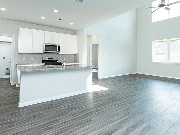 Dining Area to Kitchen and Family Room