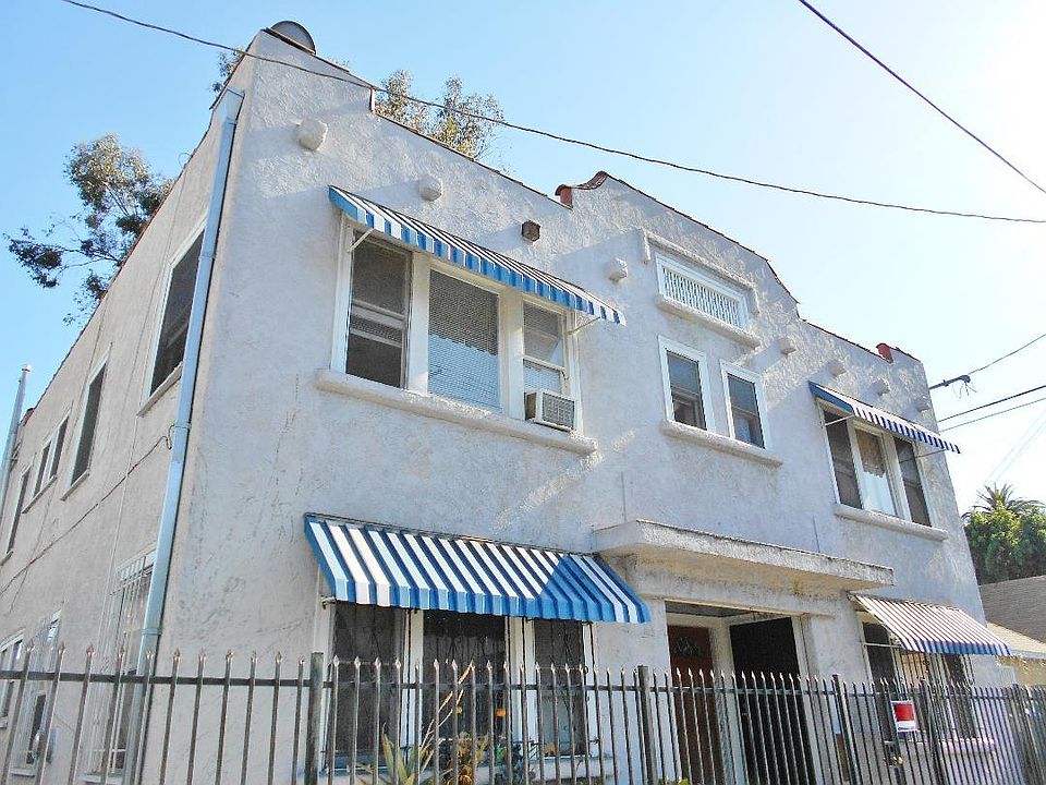 Front of building with security code gated entrance