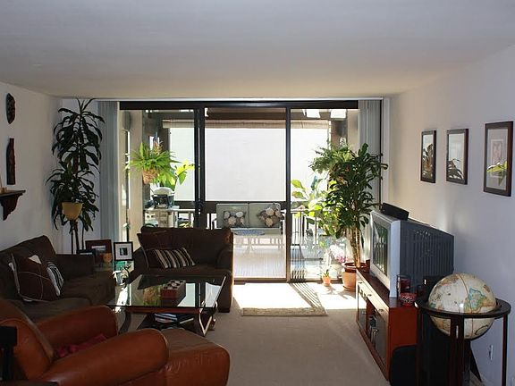 View from the front door leading through the living room to 