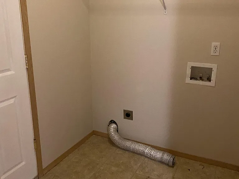 Laundry Room Downstairs - Access to 2 Car Garage