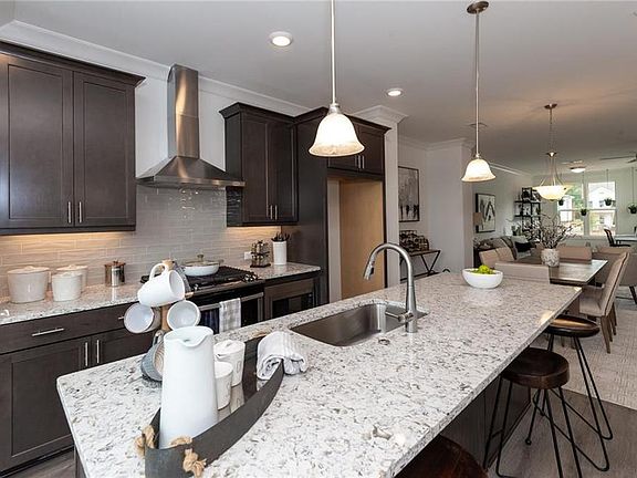 Photos NOT OF ACTUAL HOME- But of previously built Garwood Model- Home is under construction