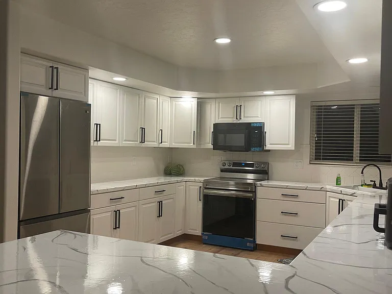 New smart Samsung double door fridge. Kitchen has new recessed lighting to add ambiance in the kitchen.