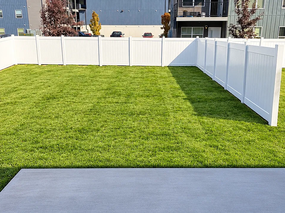 Patio with private fenced in backyard. Gate included
