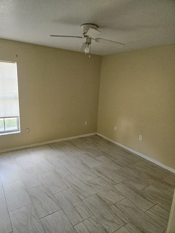 This is a great 2 bedroom with tile and a nice 2 backyard close to many shopping centers areas — Photo 1