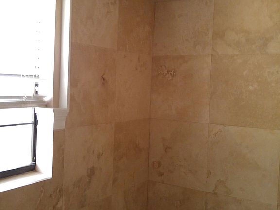 Master shower with marble