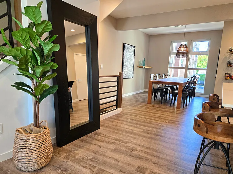 The main living floor provides separate open space for casual living