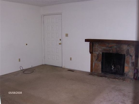 LR w/wood burning fireplace.