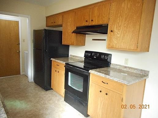 Electric range, vent hood and refrigerator