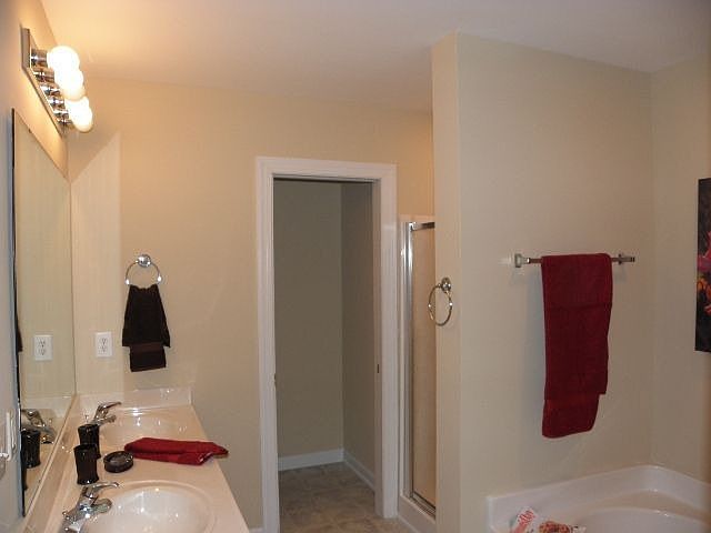 elegant master bath has seperate shower and 2 sinks