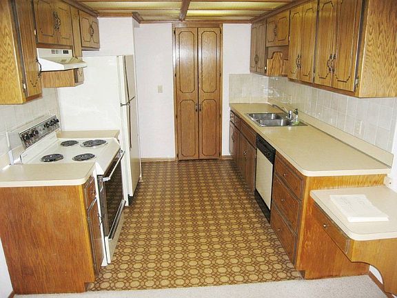 Kitchen with lots of cabinets and walk in Pantry
