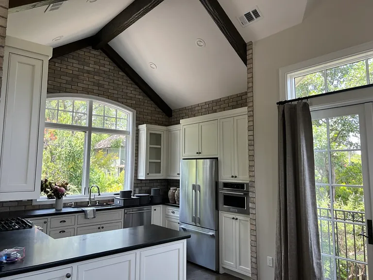 View of kitchen with French doors overlooking the garden.
