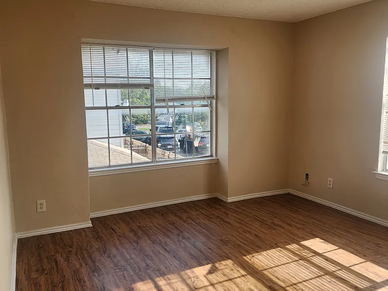 Largely adequate master suite with its own walk in closet. Great wall space for decorating and TV