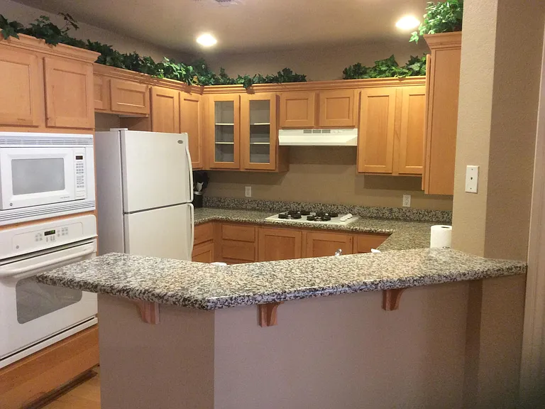 Beautiful kitchen with new sink, dishwasher, microwave .
