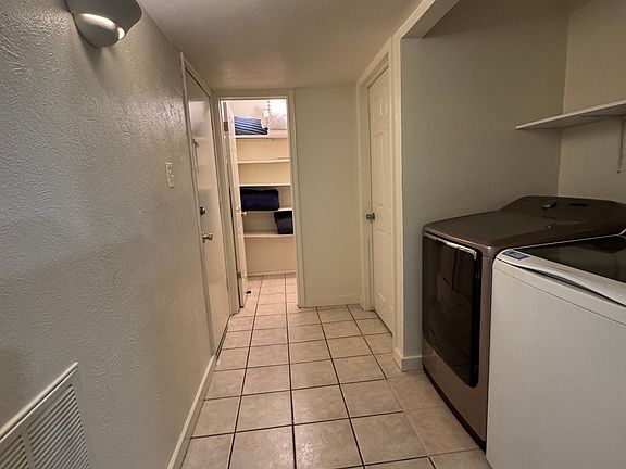 laundry area and closet