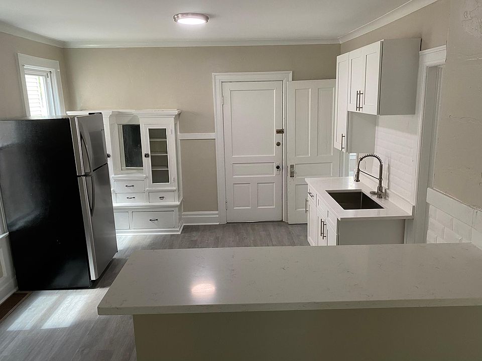 Brand new kitchen with new appliances, cabinets, and quartz counters