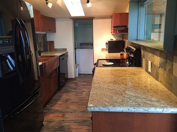 Bright kitchen with granite countertops
