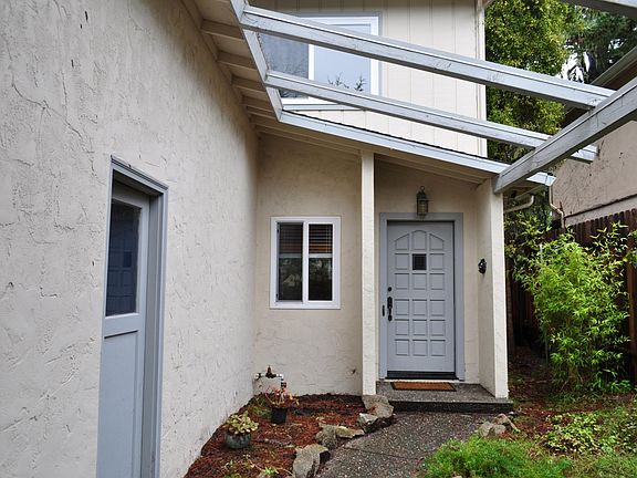 Front door on right side. Side door is garage door.