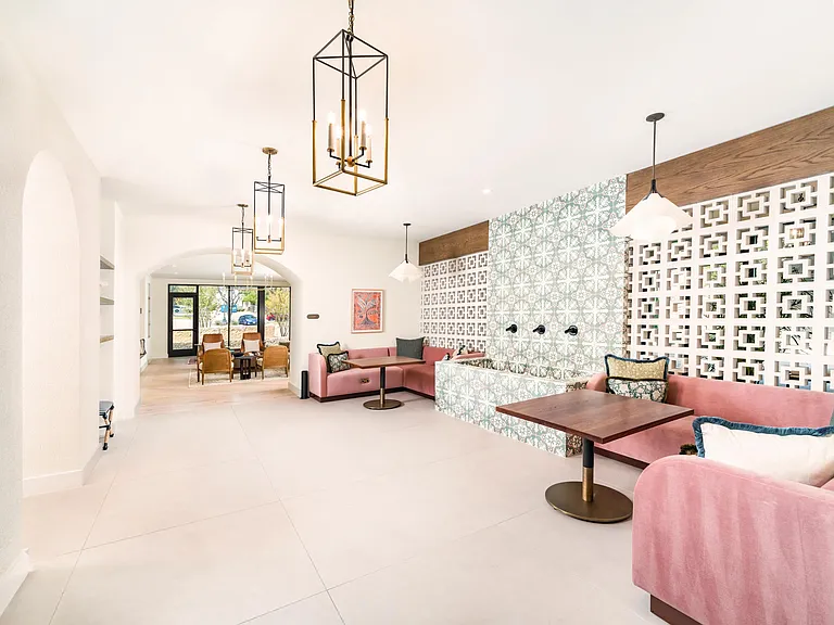 Stylish common areas at Modera Trailhead feature bold patterns and cozy seating nooks, perfect for working or unwinding in comfort.