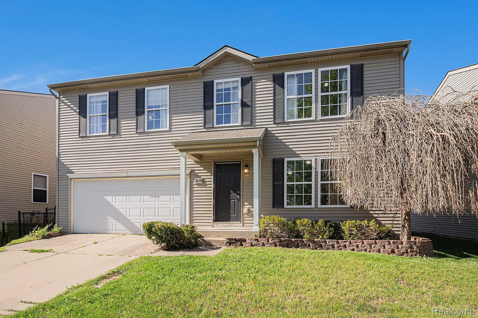 8608 Rifle River Dr photo 1