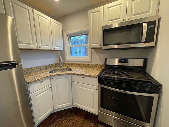 Full-size, newly updated kitchen w/ stainless steel appliances and beautiful wood floors, spacious enough to accommodate a small dining table. Bright and sunny w/ natural light beaming through 2 windows perfect for cooking meals, gathering,and creating l
