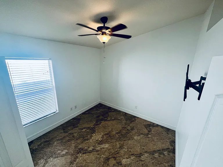 Bedroom 3. Pre mounted wall tv stand. 
Walk-in closet.