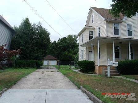 front exterior w driveway newer