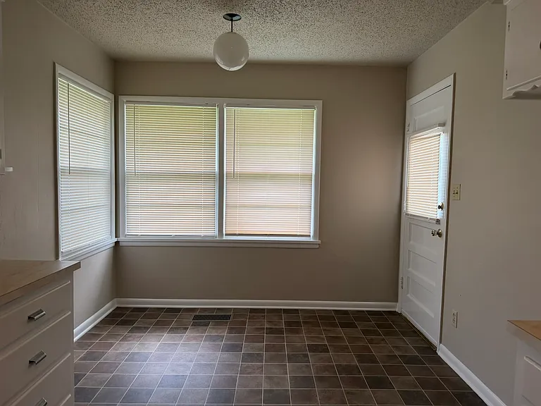 Eating Area and door to backyard.