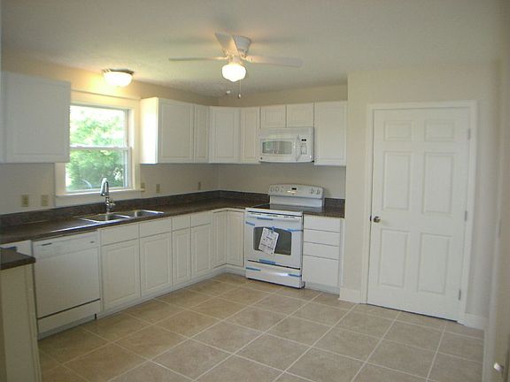Smooth-top stove, built-in microwave, and dishwasher...huge pantry.