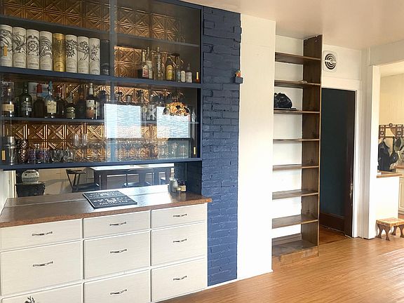 Additional kitchen storage and built-in bar