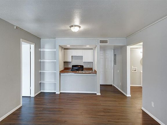 LIVING ROOM OPEN TO THE KITCHEN