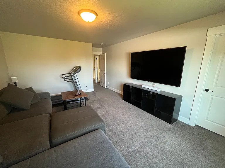 Bonus Room with Sonos Surround Sound and a treadmill