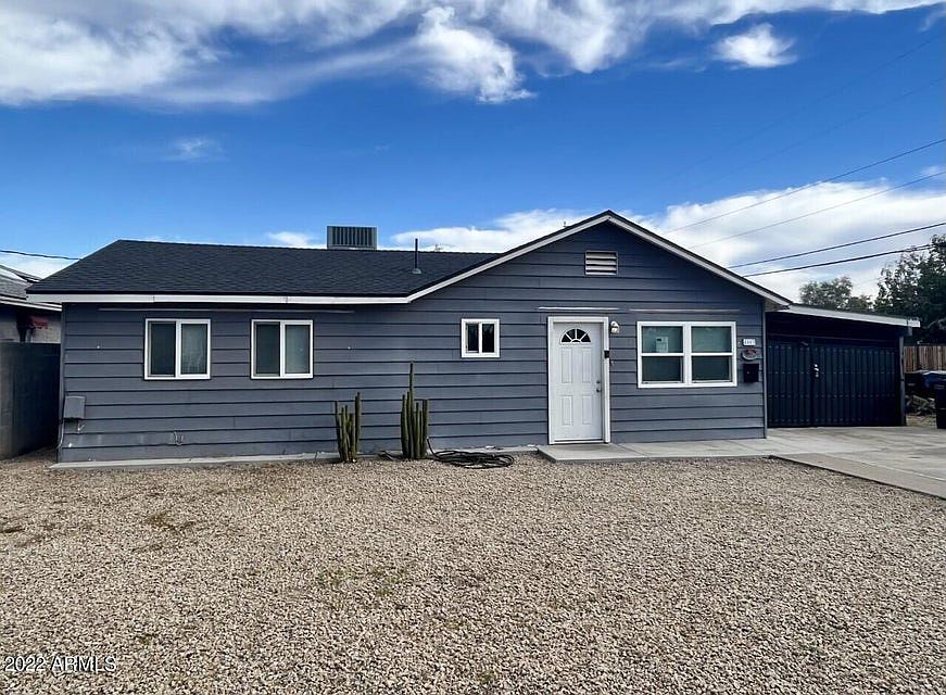 Front of Home, West Facing, quiet neighborhood, low maintenance yard. Gated locking carport