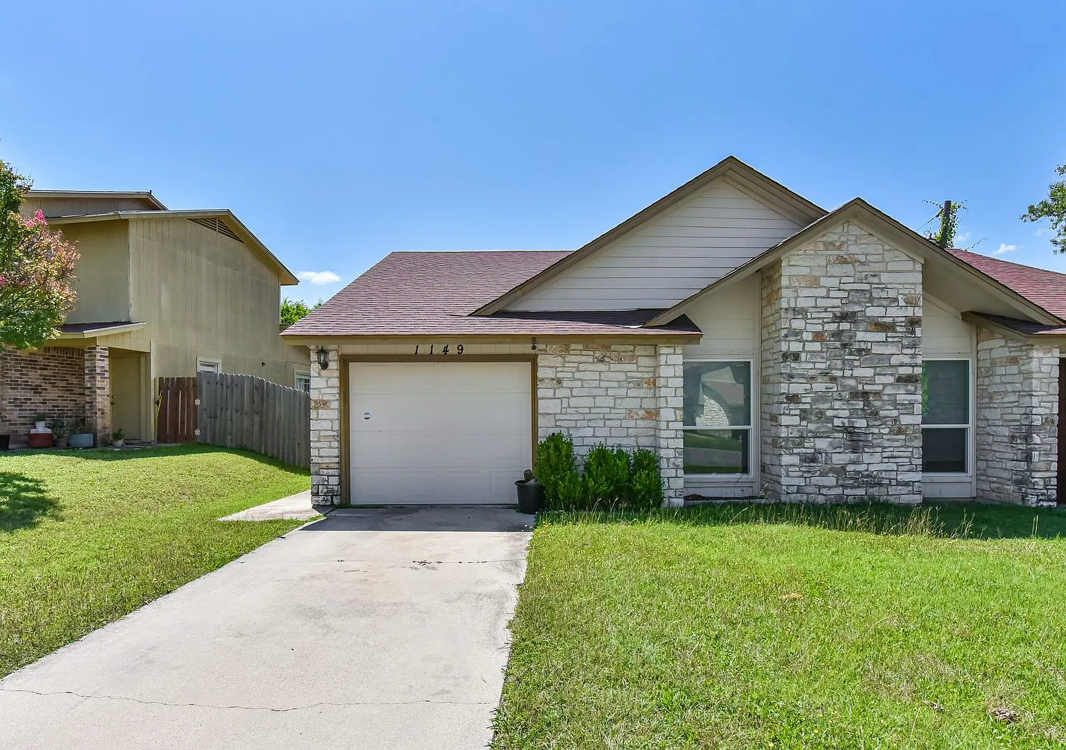 Inviting Townhouse with Cozy Fireplace & Fenced Backyard! — Photo 3