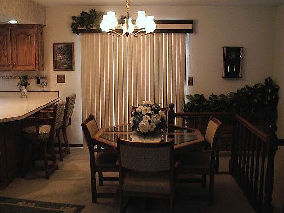 Dining area with patio door to deck