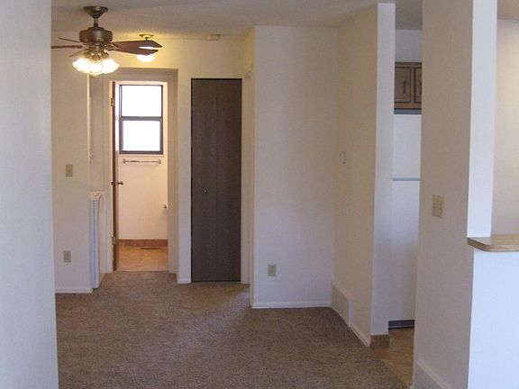looking from living room into dining area, full bathroom