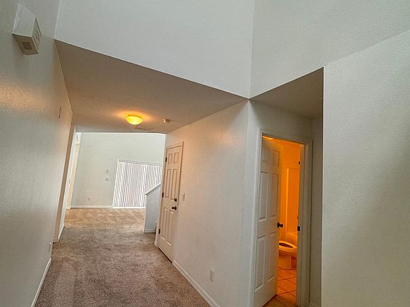 entry, with full bathroom and bedroom off to the right