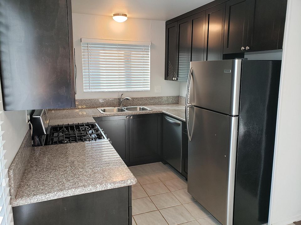 Upgraded gas stove, dishwasher, stainless frig and lots of cabinets.