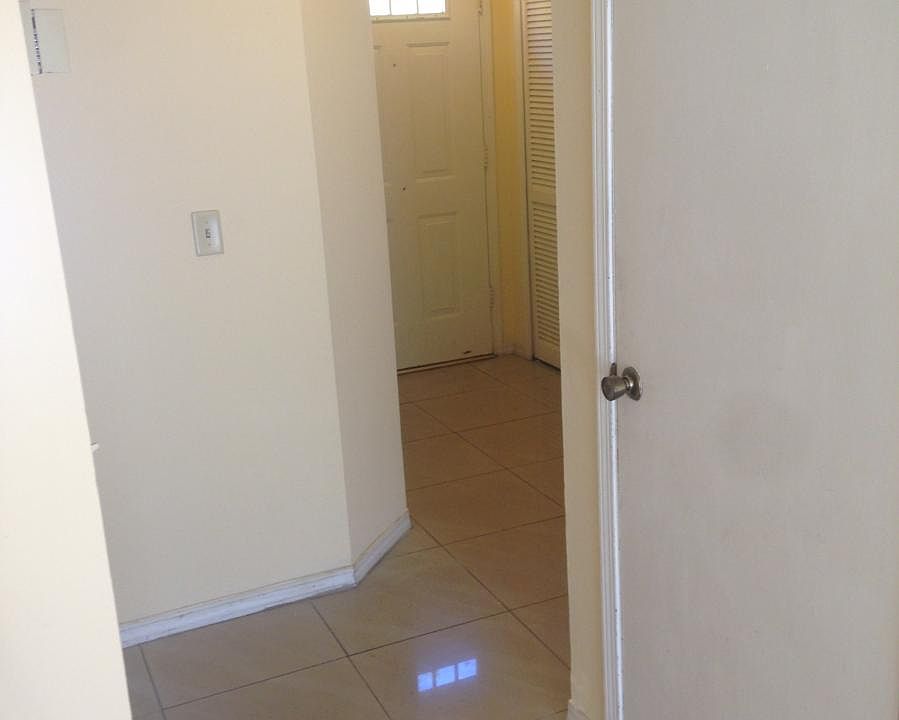 entrance / bathroom to the left.