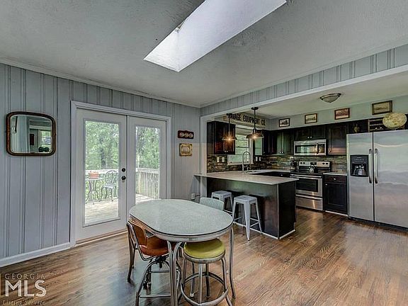 4 skylights throughout the upstairs offer tons of natural light