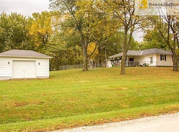 Storage shed/workshop has power and room for all your equipment.