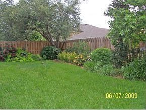 Lush Landscaping & privacy fenced yard