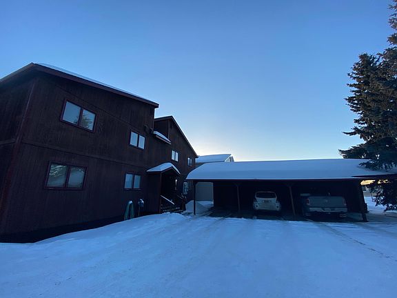 Back of building showing carport