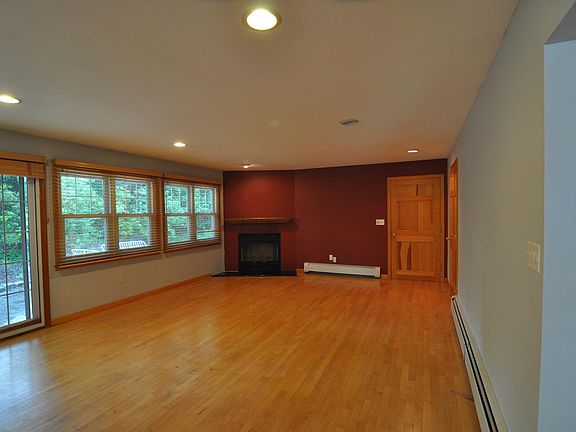 Kitchen opens to Great Room with Fireplace