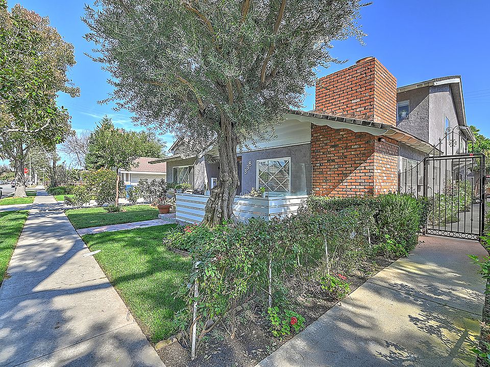 Front right side of property. Unit 2 for rent is through the gate.