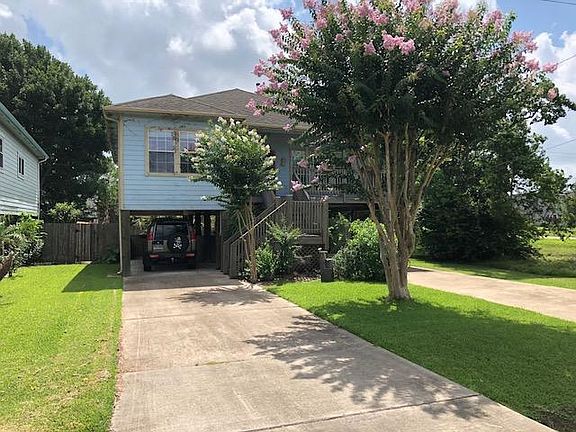 Front of house (left driveway view)